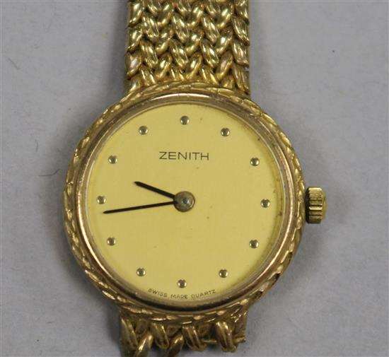 A ladys 9ct gold Zenith manual wind wrist watch, on a 9ct gold bracelet,